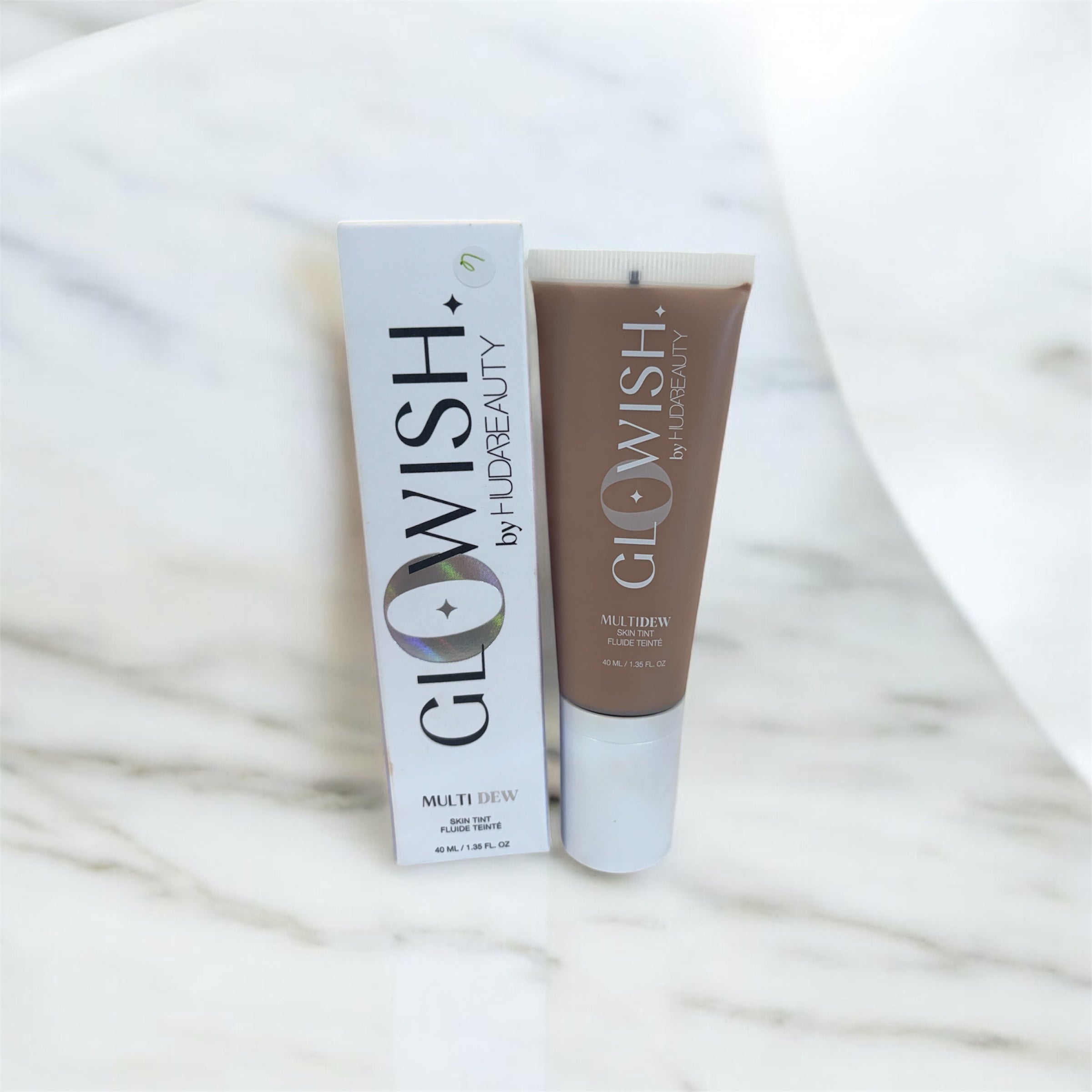 Huda Glowish Multidew Skin Tint *Tan Light 07*