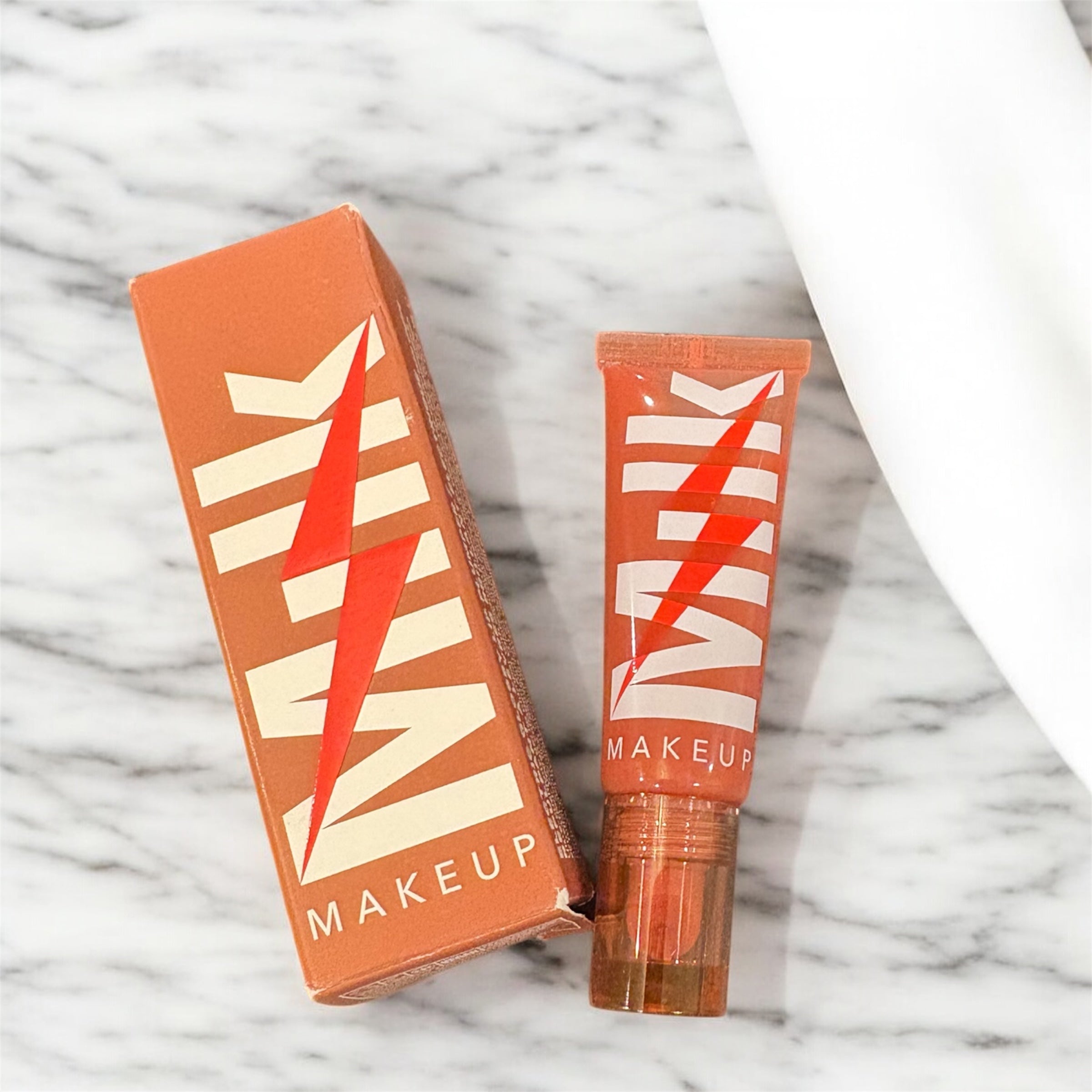 Milk Makeup Electric Glossy Lip Plumper – Buzzed