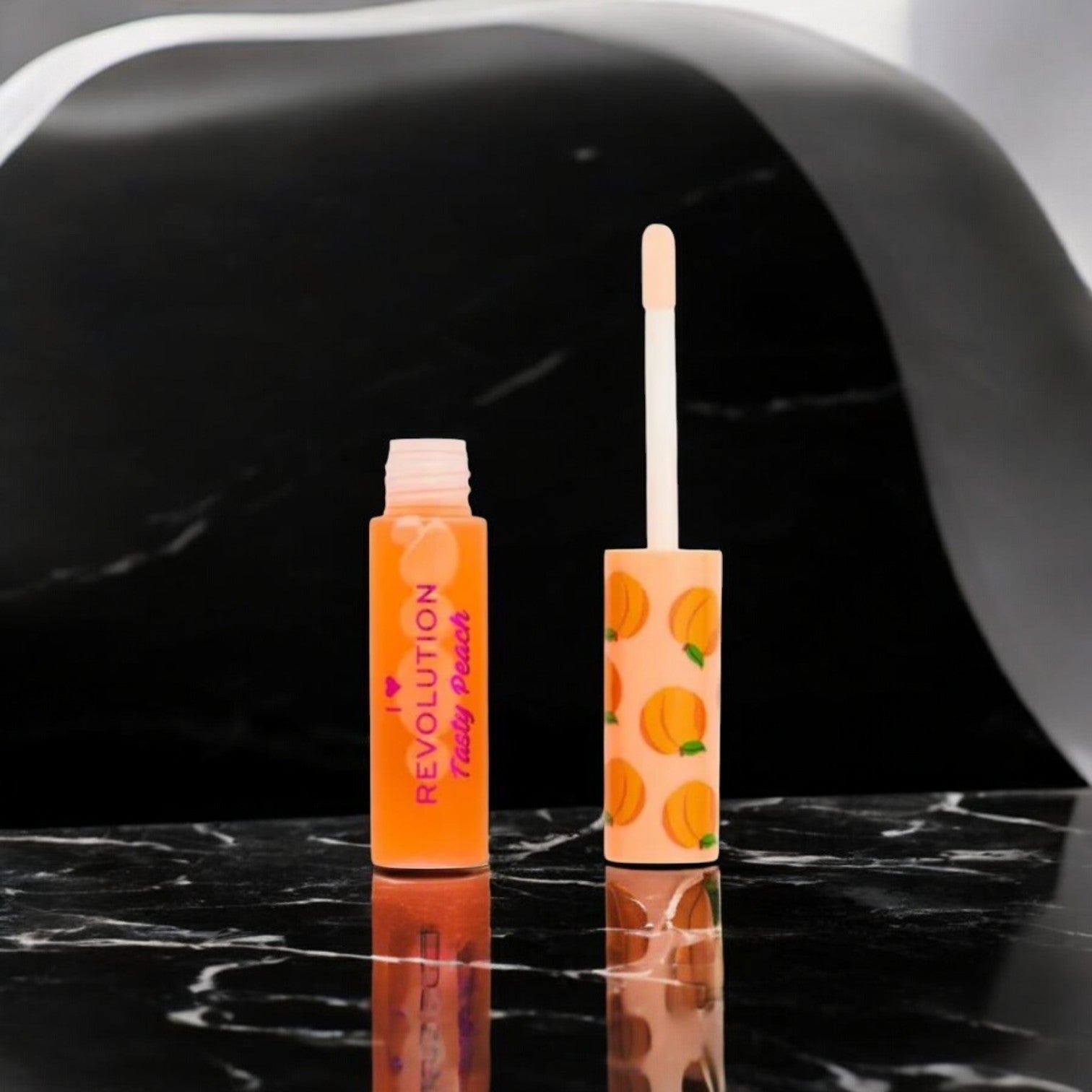 Revolution Tasty Peach Lip Oil in Sweet Peach
